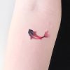 Minimalist watercolor carp tattoo