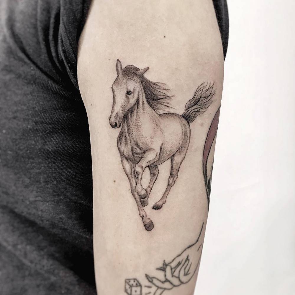 Small Horse on Side Tattoo Idea