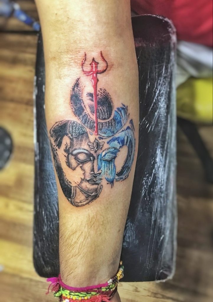 Naksh Tattoos  This tattoo design represents Lord Shiva and power A  trident also known as trishul is the weapon of Lord Shiva and the three  points of it have different meanings