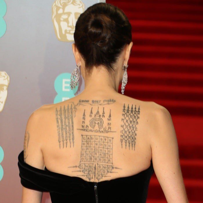 Angelina Jolie bound to ex Brad Pitt by Thai tattooist  Daily Mail Online