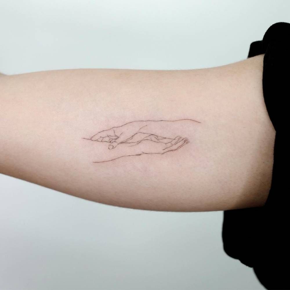 Pin by Rohini Jayashankar on Tattoo goals  Hand holding tattoo Hand  tattoos Two hands tattoo