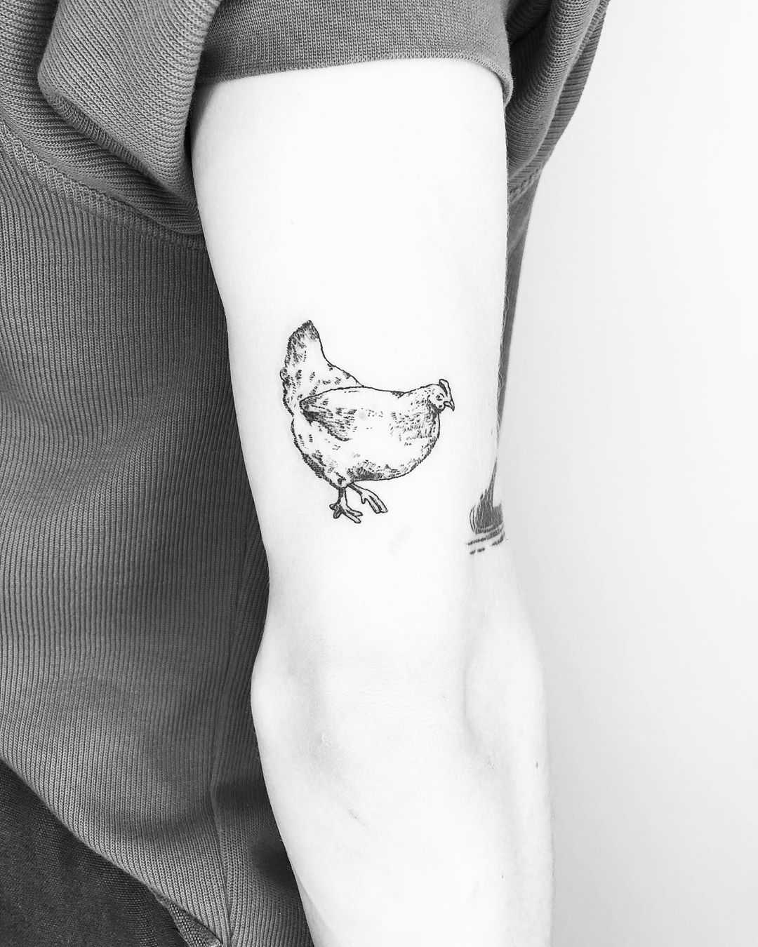 Meaning of Rooster and Chicken Tattoos